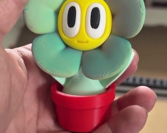 Smiling Flower Figure in Pot