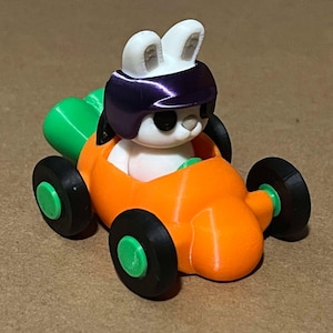 にんじんカートに乗ったゆらゆら揺れるイースターバニー - 取り外し可能なバニー付き!