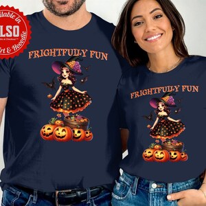 May include: Navy blue t-shirts with a Halloween-themed graphic. The design features a cartoon witch in a black polka-dot dress, a witch hat, bats, and jack-o'-lanterns. The text "FRIGHTFULLY FUN" is printed above the graphic.