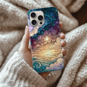 May include: A smartphone case featuring a stained glass style design with a vibrant night sky, purple and blue clouds, a bright central star, and golden waves at the bottom. The artwork uses dark outlines to create a mosaic effect across the surface.