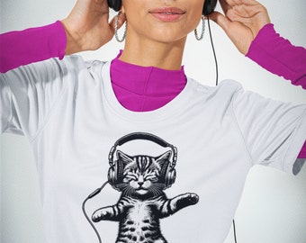 May include: White t-shirt with a black and white illustration of a cat wearing headphones. The cat is smiling and has its eyes closed. The cat is surrounded by a black cord.