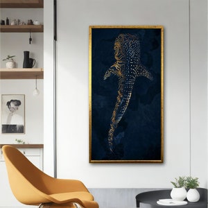 May include: An abstract art print of a whale shark in gold and blue. The shark is outlined in gold and has a dark blue background.