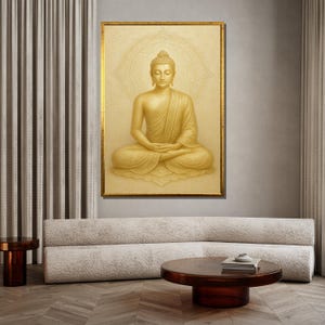 May include: A golden Buddha statue sitting in meditation pose with a mandala behind it. The statue is framed in a gold frame and is set against a neutral background.
