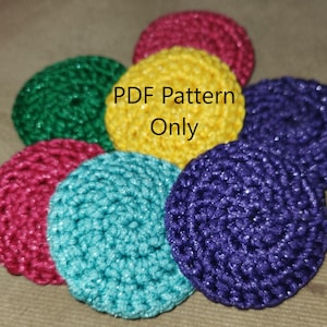 May include: A colorful crocheted flower with six petals in shades of green, pink, yellow, blue, and purple. The text "PDF Pattern Only" is written in white on the yellow petal.