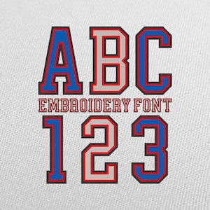 May include: Close-up of a white fabric with the letters ABC and numbers 123 in a collegiate style font. The letters and numbers are blue with a red outline and a gray interior. The text "EMBROIDERY FONT" is below the letters.