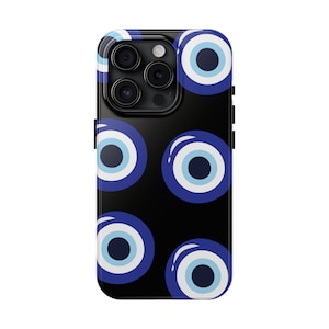 Black background with large evil eye blue and white design Tough iPhone Cases