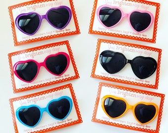 May include: Six Valentine's Day cards with heart-shaped sunglasses and the text "You brighten my day!"  Happy Valentine's Day! Hensley Anne