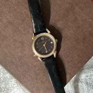 TIMEX Indigo Quartz Vintage Gold tone and black leather Wrist Watch