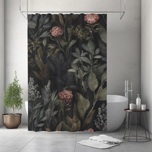 May include: A dark shower curtain featuring a botanical design with large leaves and flowers in shades of green, brown, and pink. The curtain is hanging in a bathroom with a white tub and a small potted plant.