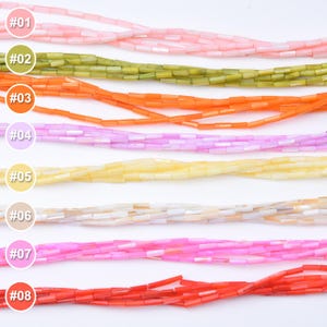 Pode incluir: Uma coleção de oito fios de contas coloridas. As contas são em várias tonalidades, incluindo rosa, verde, laranja, roxo, amarelo, branco e vermelho. Cada fio é rotulado com um número de #01 a #08.