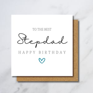 May include: A white card with black text that reads "To the best Stepdad Happy Birthday" with a blue heart.