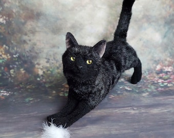 Realistic toy stuffed animal black cat . Pet portrait . plush stuffed cat .