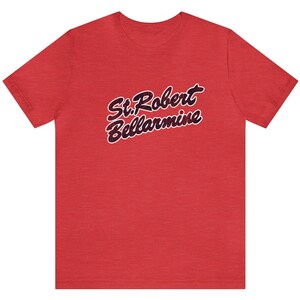 May include: Red t-shirt with a black and white graphic print that says "St. Robert Bellarmine".