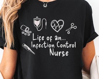 May include: Black t-shirt with white text and medical-themed graphics. The text reads "Life of an... Infection Control Nurse." The design includes a pill bottle, IV bag, heart monitor, and scissors.