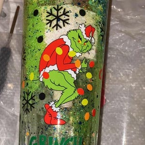 Grinch snowglobe cup with lid and straw