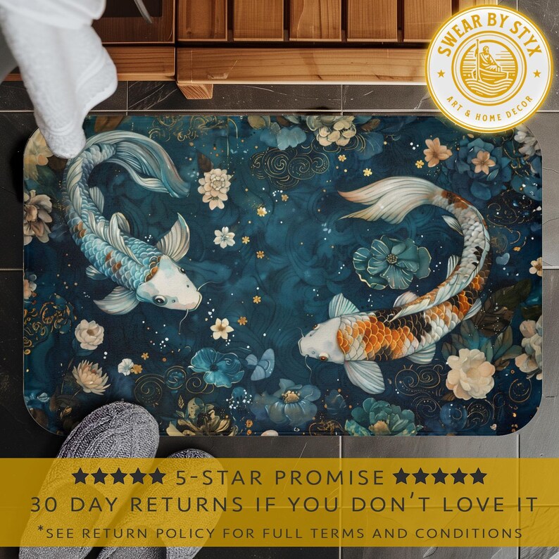 May include: A blue and white bath mat with a floral pattern and two koi fish swimming in opposite directions. The mat has a dark blue background with gold accents. The text "SWEAR BY STYX ART & HOME DECOR" is in a white circle with a gold star border.