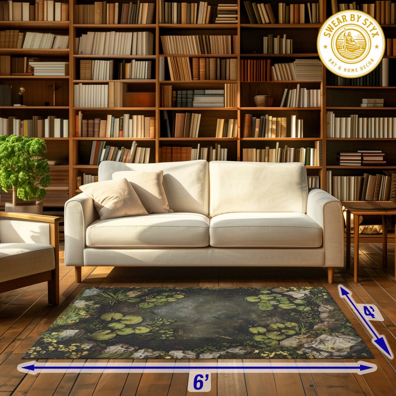 May include: A dark green and brown area rug with a circular pattern of lily pads and rocks. The rug is 6 feet wide and 4 feet long. It is placed in a living room with a white couch and bookshelves.