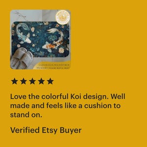 May include: A blue bath mat with a colorful Koi fish design. The mat is made of microfiber and has a memory foam backing. The text "LUXURIOUS MICROFIBER MEMORY FOAM BATH MAT" is printed on the mat.