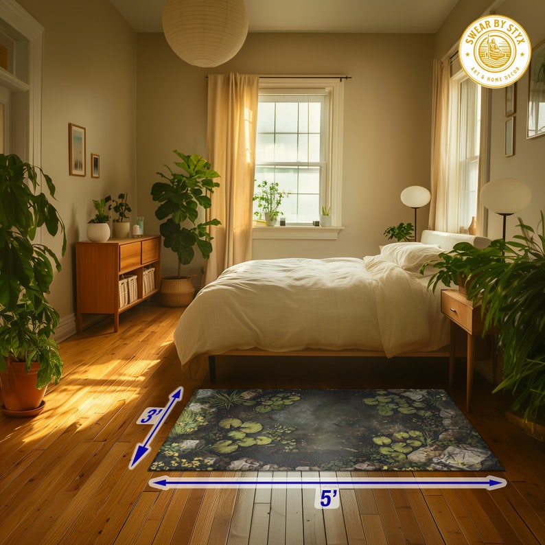 May include: A dark green and brown area rug with a leafy pattern. The rug is 5 feet wide and 3 feet long. The rug is in a bedroom with a bed, a dresser, and plants.