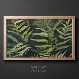 May include: A framed painting of a lush green fern plant. The painting is in a light brown wooden frame.
