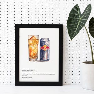 May include: A black framed print with a watercolor illustration of a glass of vodka and a can of Red Bull. The text below the image reads "Vodka Redbull - The beverage of choice for those who prefer their heartbeats to keep pace with EDM beats. See also: life of the party."