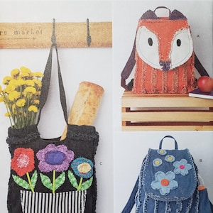 May include: Simplicity pattern 8357 features three different bag designs. One is a black tote bag with flower appliqués, another is a fox-shaped backpack, and the third is a denim backpack with flower appliqués. The pattern is one size.