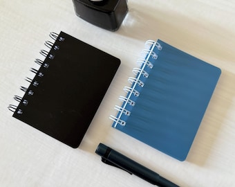 Customizable Mini Spiral Pocket Notebook – 120gsm, 120pgs, Black or Blue Cover With Inner Folder in Blank, Line, Graph, Dot Grid