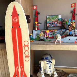 fiber glass 70s skateboard
Rocket. vintage skateboard