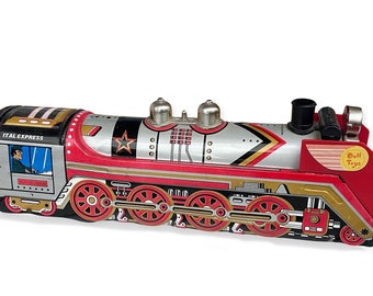 Lokomotive aus Blech und Kunststoff der Marke Doll Toys, Ital Express XII-67891. Herkunft Argentinien 70er Jahre. Vintage-Reibungszug mit Sirene.
