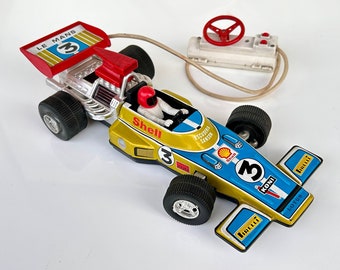 Lotus F1 Blechrennwagen mit Kabelfernbedienung. Große Größe, 40 cm Ideale Marke, Spanien 70er Jahre. Lotus Sanson-Team