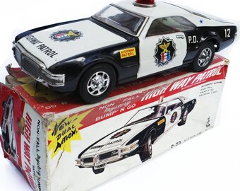 Antique tin police car Taiyo High Way Patrol