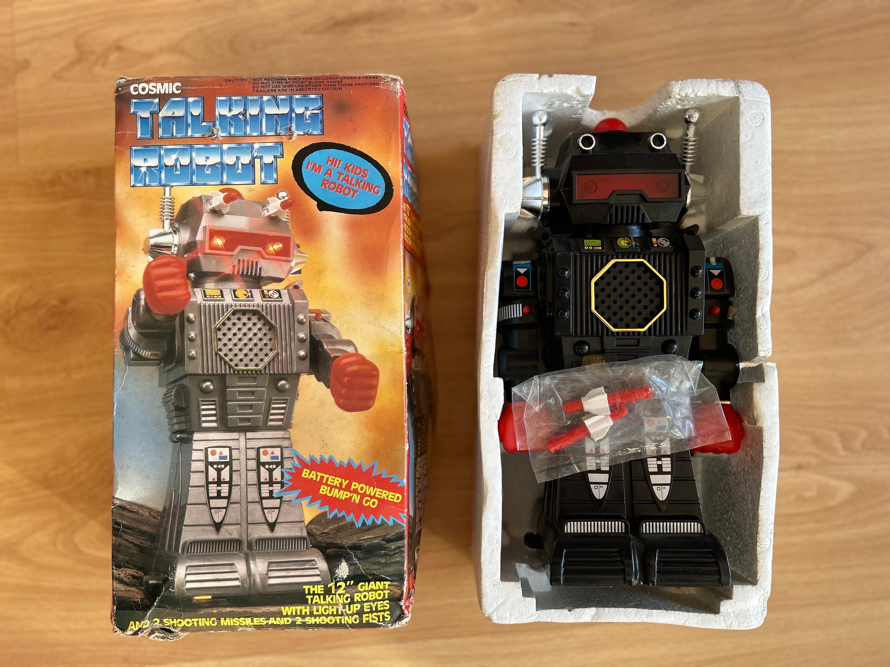 Cosmic Talking Robot From the 80s, Talks When You Press Its Head