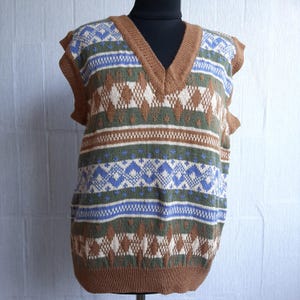 Knitted women&#39;s multi-colored vest, handmade knitted clothing, original fashion vest