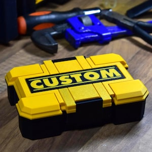 Storage box for tools and accessories