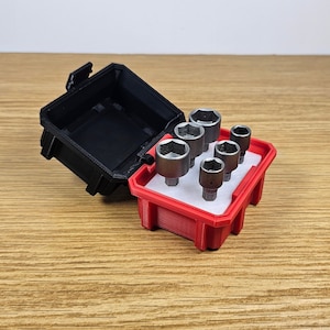 May include: A red and black plastic case with a foam interior holds a set of six silver socket wrenches.