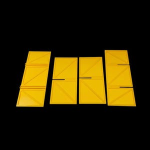 May include: Four bright yellow rectangular panels, each featuring a raised diagonal line creating two triangular sections. The two outer panels have horizontal ridges, while the two inner panels have a central horizontal slot cut into them.
