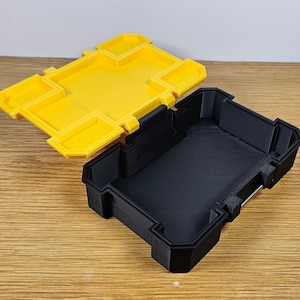 Storage box for tools and accessories for use with DeWalt Tstak and toughsystem storage.