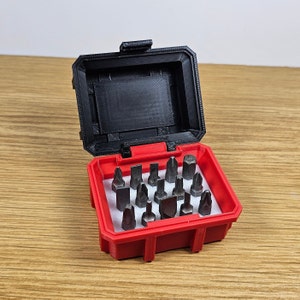 Storage case for screwdriver / drill bits and for use with the Milwaukee Packout storage system.