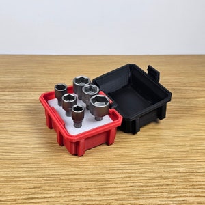 May include: A red and black tool case with a set of six silver socket wrenches. The case has a white foam insert with cutouts for each wrench.