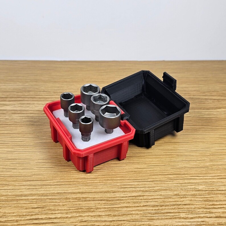 May include: A red and black tool case with a set of six silver socket wrenches. The case has a white foam insert with cutouts for each wrench.