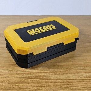May include: A yellow and black plastic storage box with the word "CUSTOM" printed on the top.