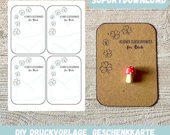 May include: Printable gift card template featuring four blank cards with a clover design and the text "KLEINER GLÜCKSBRINGER für Dich" (Small good luck charm for you).