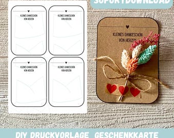 May include: Printable DIY gift card template with the text "Kleines Dankeschön von Herzen" (Small thank you from the heart) and a blank space for a message. The template is shown with a finished example of the card with dried flowers and red hearts.