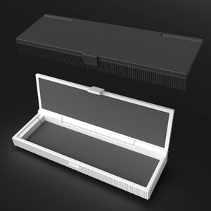 Image displaying two Teenage Engineering OP-Z cases: a closed black case showcasing its sleek, durable exterior, and an open white case revealing the custom foam inlay designed for optimal protection of the synthesizer..