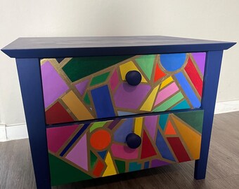 Unique set of drawers for bedside or showpiece. Beautiful blue and multicolor geometric design. One of a kind!