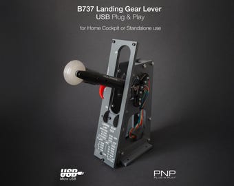 May include: A gray metal B737 landing gear lever with a black handle and a white knob. The lever has a USB connector and is labeled "USB Plug & Play" and "for Home Cockpit or Standalone use".