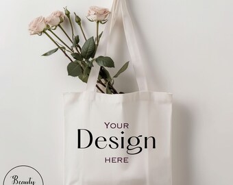 Weiße Einkaufstasche Mockup, Einkaufstasche Mockup, Hintergrund im Minimalismus-Stil mit Blumen in der Tasche, weiße Tasche, leere Vorlage, digitale Datei