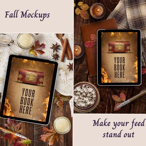 May include: A digital tablet display featuring a graphic of a wooden chest with gold hardware set against a fiery background with the text YOUR BOOK HERE, surrounded by autumn leaves, candles, cinnamon sticks, and a pen on a wooden surface.