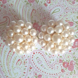 Faux Pearl Clip on Earrings on a gold tone base.