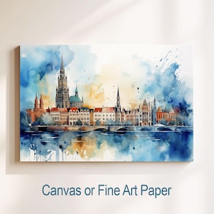 Peut inclure: Peinture à l'aquarelle d'un horizon urbain avec une rivière au premier plan. Les bâtiments sont peints dans des tons de brun, rouge et jaune, et le ciel est un mélange de bleu et de jaune. La peinture est sur toile ou papier d'art.